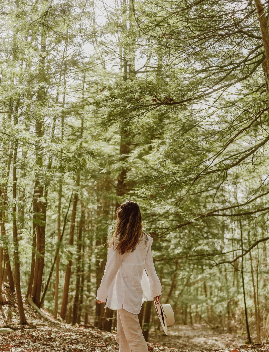 Woman Walking in the Forest